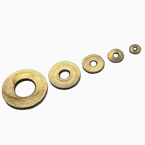 Brass Flat Clock Washers Set 100 Pcs Round Hole Mixed Sizes 2mm To 9mm For Clockmaking and Movement Repair Displayed