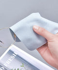 Front view: light blue microfiber glasses cleaning cloth; 230GSM, 10-pack, for cleaning round metal eyeglasses.