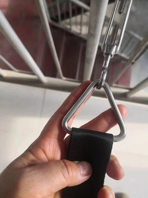 Close-up of a hand holding a Stainless Steel 316 Marine Grade Triangle Ring Buckle Welded V Shaped Heavy Duty Ring.