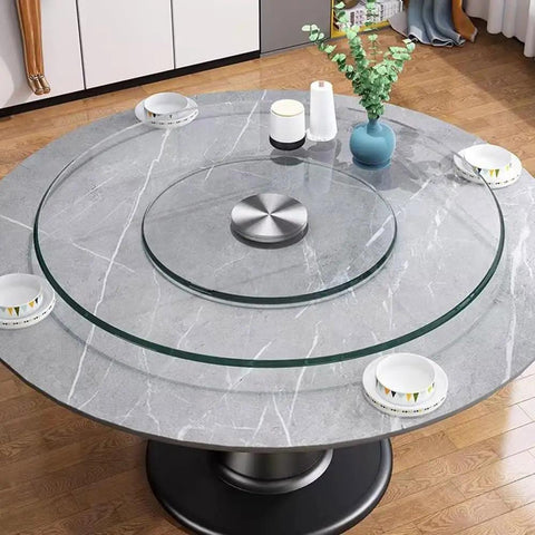 Heavy Duty Tempered Glass Lazy Susan Round Rotating Turntable Kitchen Serving Tray on marble countertop with bowls and decor.