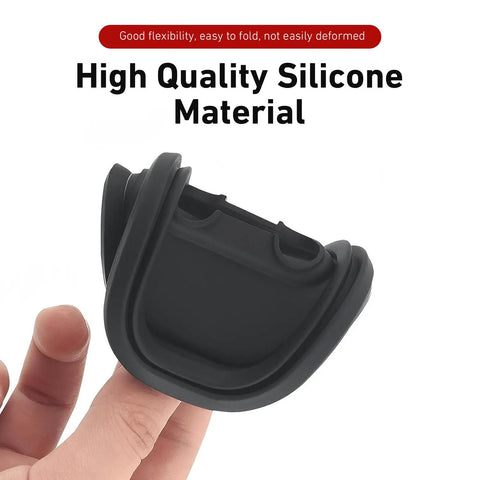 Set Of Four Rock Solid Silicone Door Latch Covers Anti Impact Bumper Pads with heavy duty black silicone material in hand.