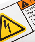 Close-up of High Voltage Warning Stickers For Electrical Panels And Industrial Equipment with yellow triangle and bolt icon