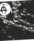 Heavy Duty Steel Motorcycle Chain Tensioner And Gear Tightener Rig Designed For Construction Bosses And DIY Hustlers Who Want No Hassle Mechanic Gear To Keep The Job Done, close-up of steel chain links and tensioner tool.