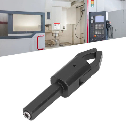 Beefy Alloy Steel CNC Bar Puller For Lathes with Hardened Handle and Integrated Jaws, shown with CNC machine background