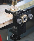 Dead Center Woodwork Punching Locator Tool For Carpentry Marking And Drawing Solid Aluminum Alloy positioned on wood.
