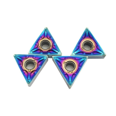 Get These Awesome Indexable Carbide Lathe Tools With Ten Tough TNMG Inserts For Precision Turning On Steel Or Cast Iron Super Hard Knives That Make Your Machining Jobs Epic And Smooth Like A Dream. Four colorful TNMG inserts for carbide lathe tools.