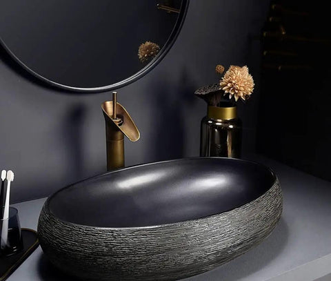 SDVantage Black Ceramic Bathroom Vessel Sink and Faucet Combo, oval countertop sink with textured design and modern faucet.