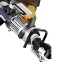 Heavy Duty Electric Hydraulic Rebar Cutter And Bender For 4-16mm Steel Bar held by gloved hand, showcasing the motor and grip design.