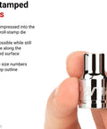 Close-up of a hand holding a chrome 3/8 Inch Drive Shallow 6-Point Socket from the 12-Piece Set with easy read markings for auto work.