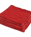 Stack of red 14x14 inch cotton shop towels, pack of 5, fully hemmed and machine washable, suitable for grease and oil cleanup.