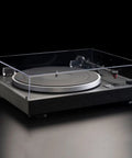 Dual CS429 Fully Automatic Belt Drive Turntable In Sleek Black With Ortofon 2M Red Cartridge visible from a side angle