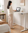 Compact Electric Standing Desk With Single Motor And One Touch Lift System Lowkey Perfect For Small Home Offices, 80x50cm white top.