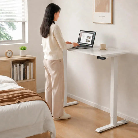 Compact Electric Standing Desk With Single Motor And One Touch Lift System Lowkey Perfect For Small Home Offices, 80x50cm white top.