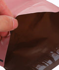 Pink 15x27cm Self Sealing Poly Mailer Bags Pack Of 100 Tear-Resistant Shipping Mailers for Small Business showing interior