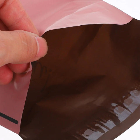 Pink 15x27cm Self Sealing Poly Mailer Bags Pack Of 100 Tear-Resistant Shipping Mailers for Small Business showing interior