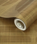 High End Geometric Stripe Gold Metallic Wallpaper For Walls Super Sleek Fibrous Finish, 2ft by 27ft roll on a textured surface.