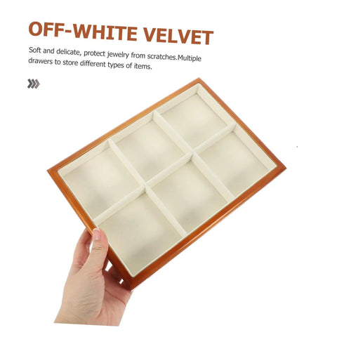 Premium Solid Wood Desktop Jewelry Organizer Tray With Divided Grid Compartments For Rings Necklaces Earrings And Watches Durable Storage Holder, off-white velvet compartments, held in hand.