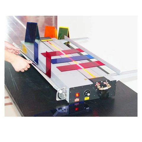 Kickass Acrylic Bending Machine 1000W Heated Pipe With Adjustable Angle Plate, user adjusting colorful plastic sheets on worktable.