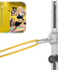 Adjustable Resistance Band Wall Anchor With Thirty Five Lockable Positions Rock Solid Metal Training Platform in use with yellow band.