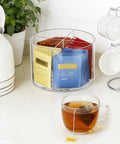 Drink Packet Organizer With 360 Degree Lazy Susan Turntable For Hydration Packets And Water Flavor Mixes, Acrylic Container Tea Bag Holder on kitchen counter