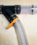 4 Inch Anti Static Dust Collection Hose 10 Feet Flexible PVC for table saw connection with steel spring on plywood wall