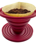 Grab-And-Go Collapsible Pour Over Coffee Dripper For Camping in red with coffee grounds