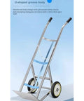 Heavy Duty Two Wheel Gas Cylinder Hand Truck And Oxygen Tank Rolling Cart with U-shaped groove body and galvanized safety chains.