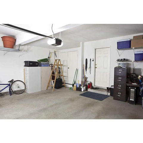 Garage with Multi Purpose Rubber Floor Mat For Indoor And Outdoor Use Built Tough To Protect Floors, black 30 by 48, installed near door.