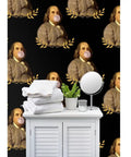 Benjamin Franklin Pvc Free Vintage Hero Wallpaper Featuring Dang Tough Polyester Blend And Rugged Linen Texture Built For High Traffic Zones With Zero Fuss Paste To Paper Install in bathroom setting with towels, mirror, and plant.