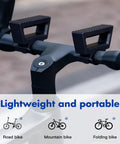 Lightweight and portable bike repair stand showing wide clamp fitting 29-34mm handlebars on road, mountain, and folding bikes.