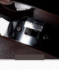 Close-up view of Top Shelf Nordic Wood Ceiling Fan Chandelier With Remote Control speed adjustment switch and logo.