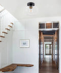 Semi Flush Mount Ceiling Light With Matte Black Finish And 8.66 Inch Clear Hand Blown Glass Shade in modern entryway