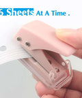 Close-up of Three Piece Mini Hole Puncher Set with Six Sheet Capacity each for ID cards and crafts, showing easy punching in use.