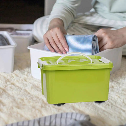 Green box with 6 Pack Stick-On Adhesive Mini Swivel Caster Wheels For Furniture And Appliances on a carpet