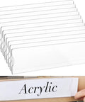 15 Piece Acrylic Name Plate Holder Set 8 By 2 Inch Clear Sign Frame With Adhesive Tape Horizontal Wall Name Plates For Door Office And Home Display Perfect For Desk Or Reception Areas set displayed in a stack with one in use showing "Acrylic" text.
