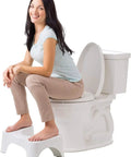 Woman demonstrating 7 Inch Toilet Stool For Killer Bathroom Posture And Comfort White, Ergonomic Stand For Standard Toilets, As Seen On Shark Tank.