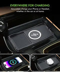 Top Shelf Dual Zone Qi Car Wireless Charging Pad Console Slot Mount For GMC Hummer EV heavy duty charger with phone and earbuds.
