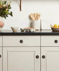 Oil Rubbed Bronze Cabinet Knobs With Backplates, 2.5 Inch, installed on white kitchen cabinets