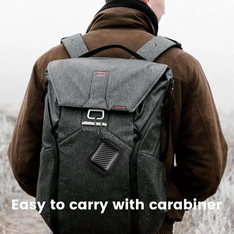 Solid As A Rock Hard Earbud Case With Smooth Pull Zipper And Secure Travel Clip For Your Daily Drivers And Mini Wireless Earbuds Beater Resistant Eva Carry Pouch attached to backpack via carabiner.