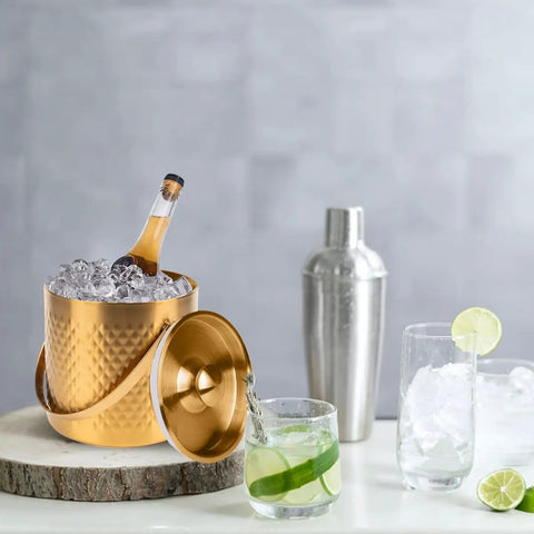 Gold Double Wall Insulated Ice Bucket With Lid And Scoop Keeps Drinks Frosty All Night Long Backyard Bash Essential Heavy Duty Stainless Steel Design Squad Approved with ice and drinks.