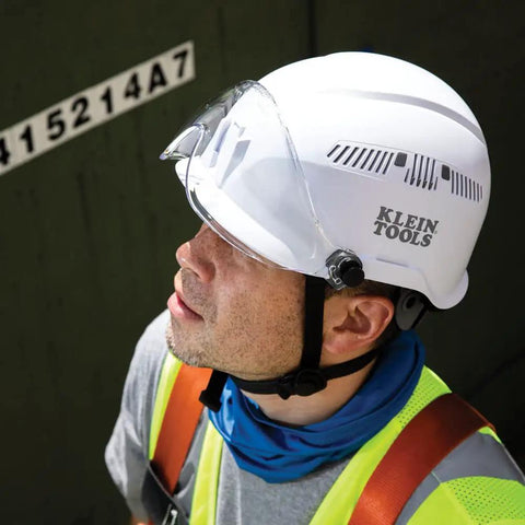 Electrician wearing safety helmet with chin strap, clear visor. MODbox Tool Pouch For Electricians Lightweight Grab And Go Work Belt Bag.