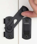 Close-up of 2 pack matte black stainless steel barn door latch being closed on white door
