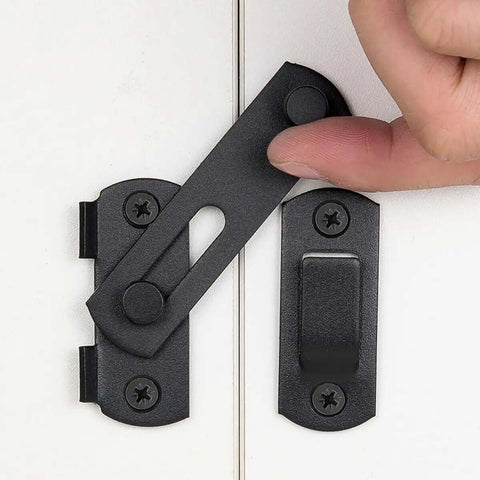 Close-up of 2 pack matte black stainless steel barn door latch being closed on white door