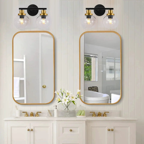 2 Light Vanity Fixture With Clear Globe Shade Black And Gold Finish Modern Wall Sconce For Bathroom Mirror Vintage Mid Century Vibe 14 Inch Long Bulb Not Included Perfect For Hallway Or Bedroom shown above a double sink vanity in bathroom
