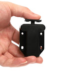 Hand holding Push To Open Cabinet Latch With Touch Release, no-handle push lock for wardrobes, drawers, black finish hardware