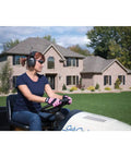Person mowing lawn wearing MP3 AM FM Digital Radio Ear Muffs With Built In Clock And Station Save Feature, front view.