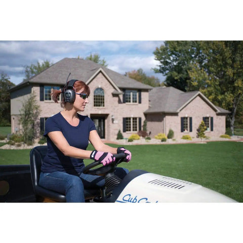 Person mowing lawn wearing MP3 AM FM Digital Radio Ear Muffs With Built In Clock And Station Save Feature, front view.