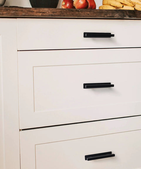 2 Pack Self Adhesive Cabinet Handles Matte Black No Drill Drawer Pulls Stick On Handles for cabinets, easy installation shown on drawers