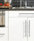 Kitchen with polished chrome T bar cabinet pulls 256mm hole centers installed on white cabinets