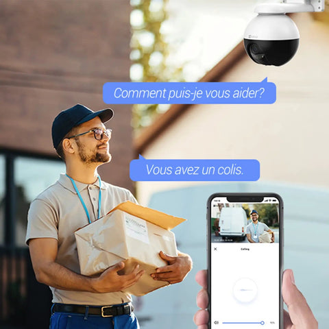 Delivery person holding a package with Outdoor Security Camera 4MP WiFi Pan Tilt All-Around Coverage IP65 Waterproof visible